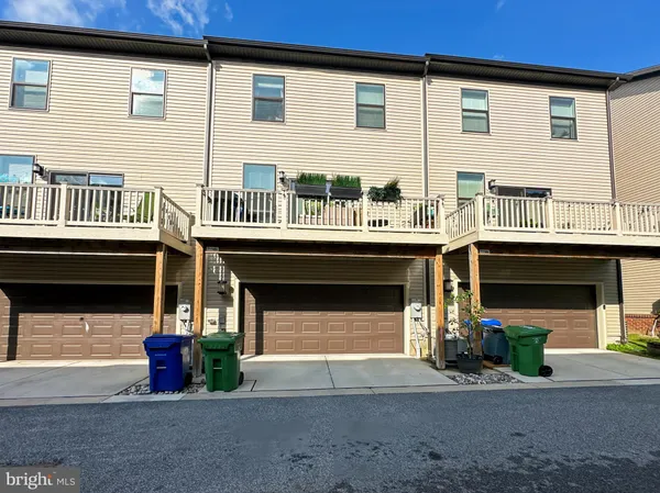 a front view of a multi story residential apartment building