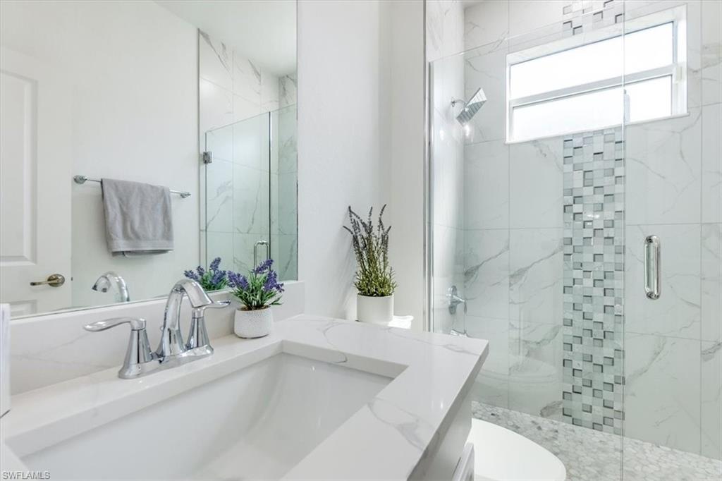 2172 Cara Cara Way Naples, FL 34120 - Photo 22 of 50 1st Floor Guest Bath