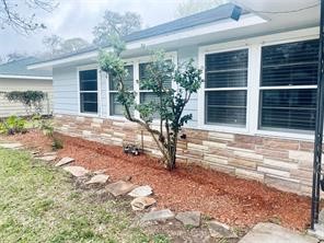 910 Magnolia Street Lake Jackson, TX 77566 - Photo 12 of 12 a view of a house with backyard