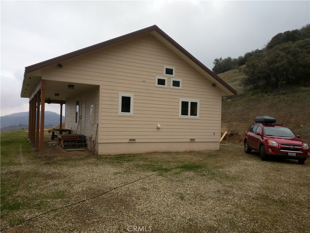 44981 Todd Eymann Road Dunlap, CA 93621 - Photo 37 of 74 a view of a house with a yard