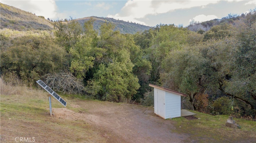 44981 Todd Eymann Road Dunlap, CA 93621 - Photo 72 of 74 a view of a dry yard with mountain and trees