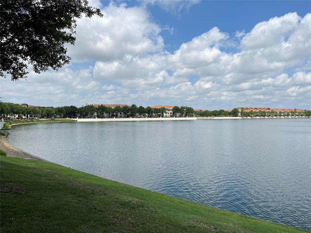 817 La Cima Irving, TX 75039 - Photo 4 of 40 Neighborhood lake with walking paths.