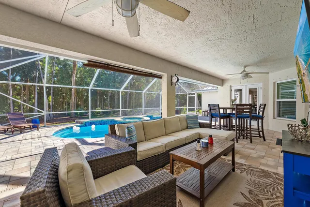 a view of indoor pool and sitting area