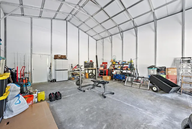 a view of a park with large trees