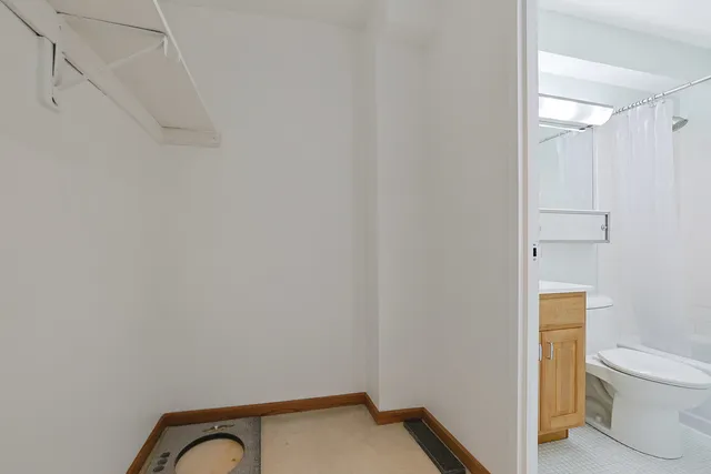 a view of bathroom with a toilet