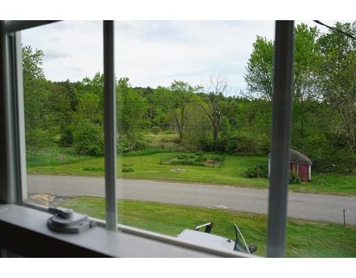 231 Woods Road Barre, MA 01005 - Photo 19 of 30 a view of a yard with potted plants