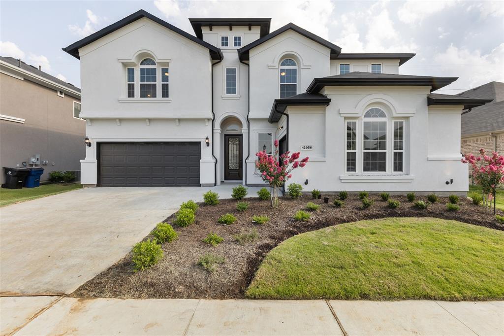 13056 Risen Star Road Frisco, TX 75035 - Photo 1 of 1 a front view of a house with a yard