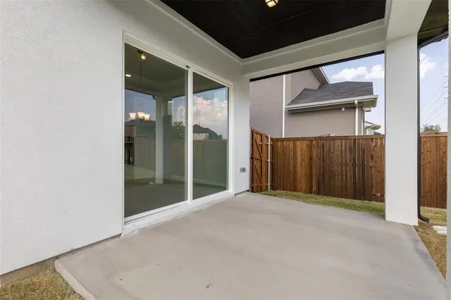 a view of a room with wooden walls