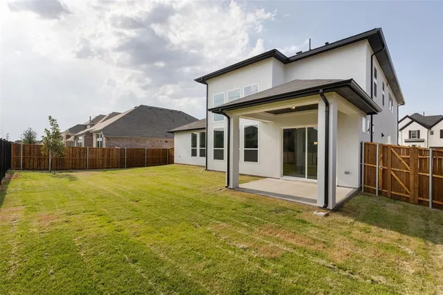 a house view with a outdoor space