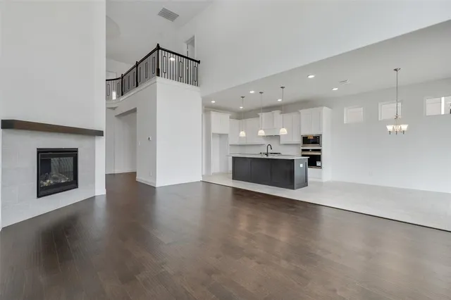 a view of a kitchen with a sink and a stove