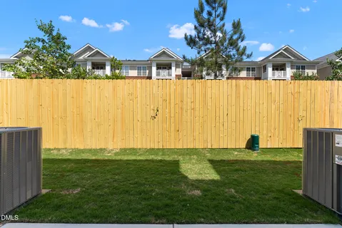 a view of a front of a house with a yard