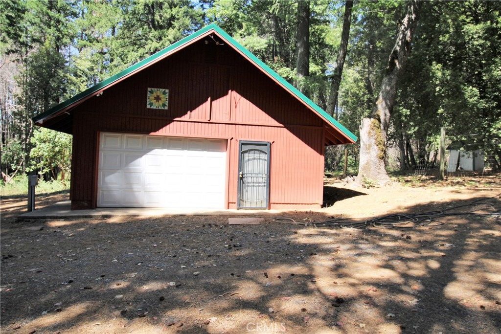 268 Milsap Bar Road Berry Creek, CA 95916 - Photo 25 of 47 a front view of a house with a yard