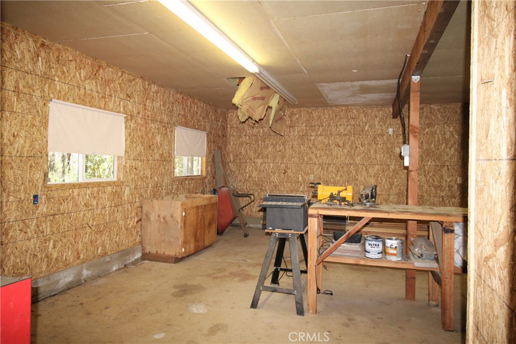 268 Milsap Bar Road Berry Creek, CA 95916 - Photo 27 of 47 a view of a workspace with furniture