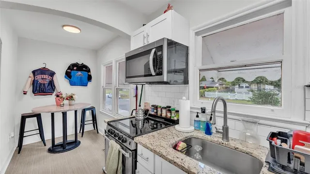 a room with furniture and window