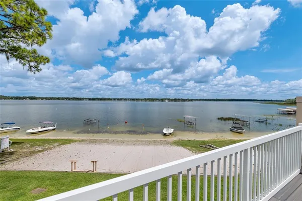 a view of a lake from a balcony