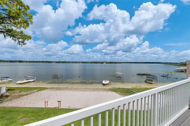a view of a lake from a balcony