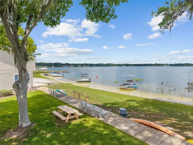 a view of a swimming pool with an ocean view