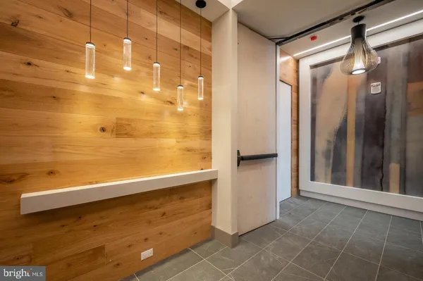 a kitchen with a table and chairs in it