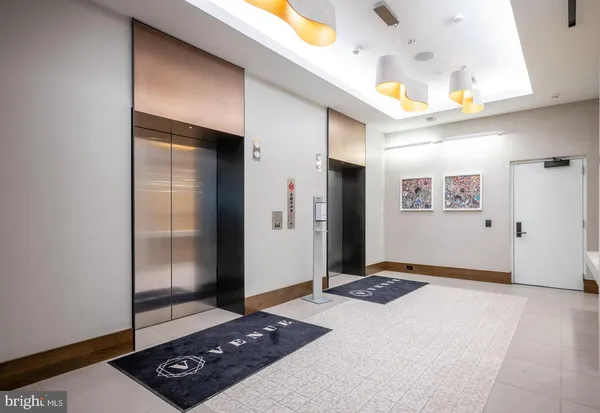 a view of a building with a glass door