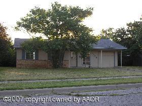 5304 Allen Street Amarillo, TX 79110 - Photo 1 of 1 a front view of a house with a garden