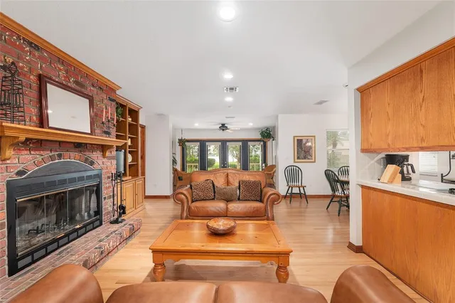 a view of house with a yard