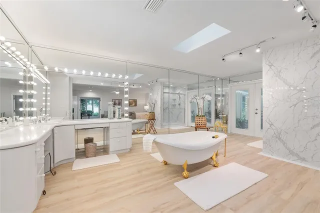 a bedroom with a bed and a fireplace