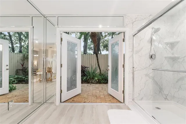 a view of a bathroom with a shower curtain
