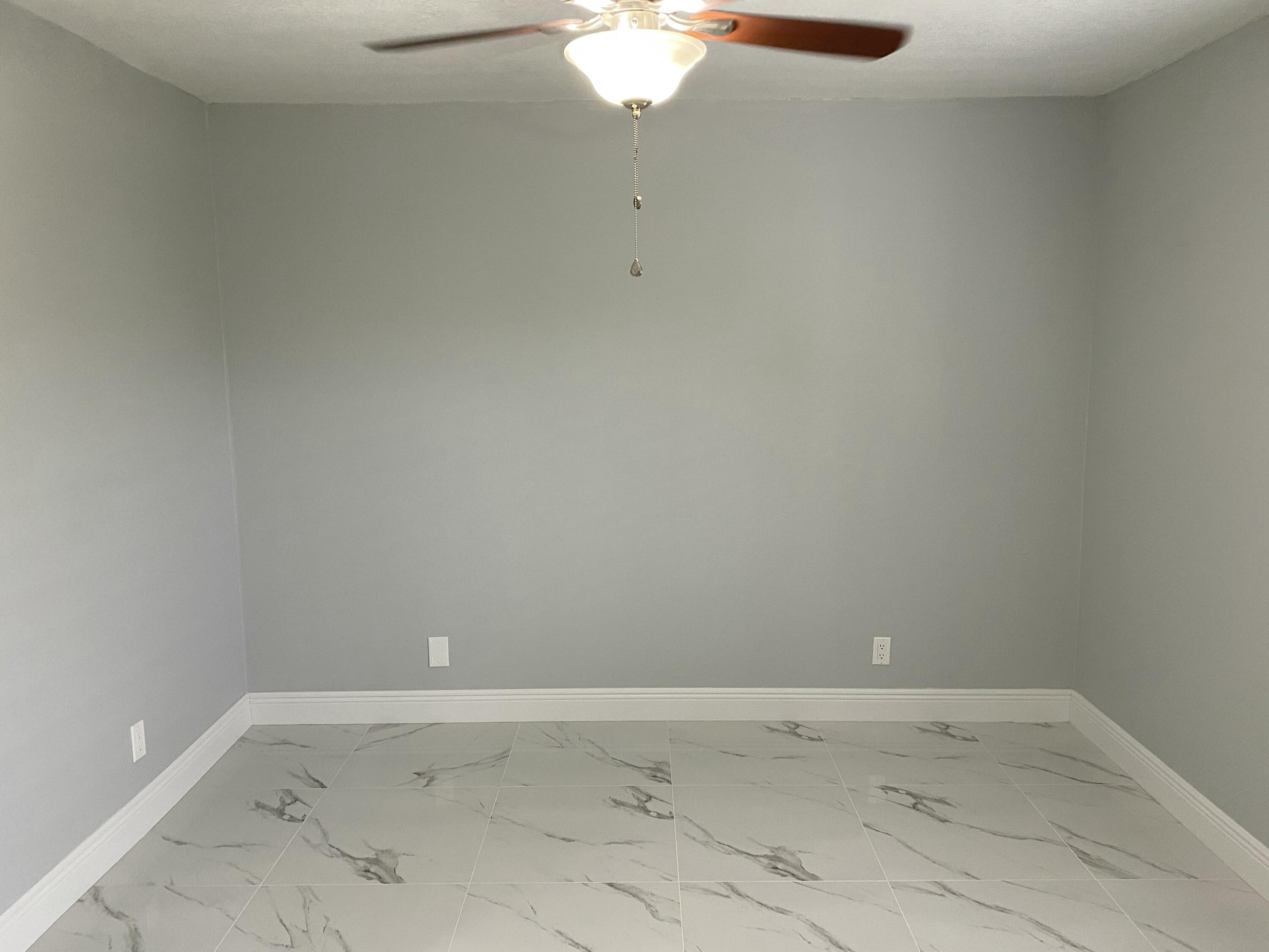 2788 Tennis Club Drive, Unit 102 West Palm Beach, FL 33417 - Photo 11 of 26 a view of an empty room