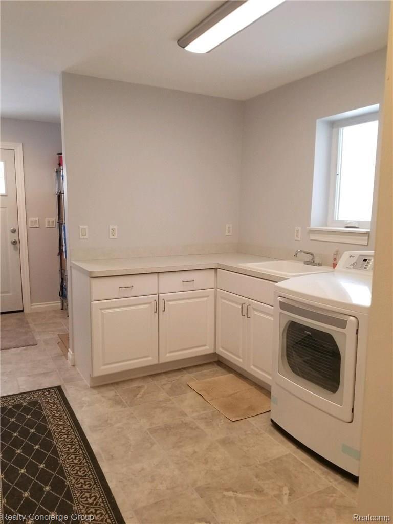 3345 South Latson Road Howell, MI 48843 - Photo 13 of 38 Brand New 200+ Sq Ft of Laundry Room with separate Mud Room