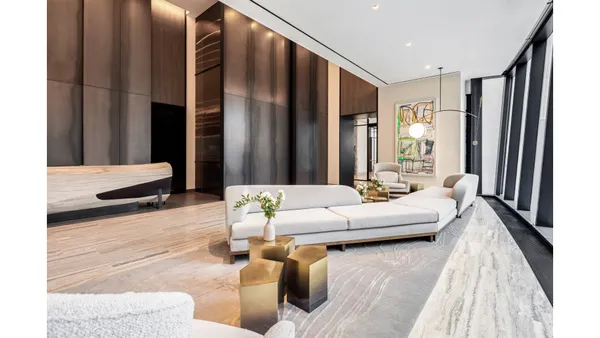a bathroom with a shower sink and mirror