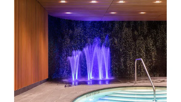 a view of a lobby room with gym equipment