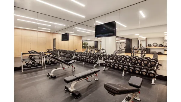 a view of a living room and dining room