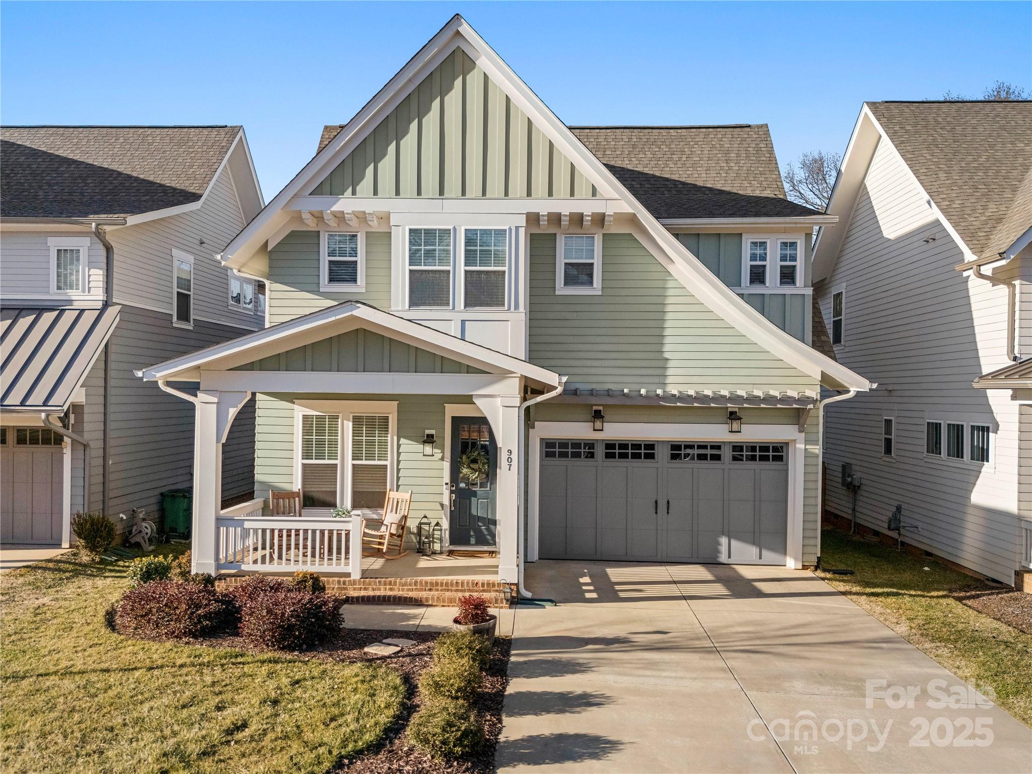 a view of a white house with a large windows