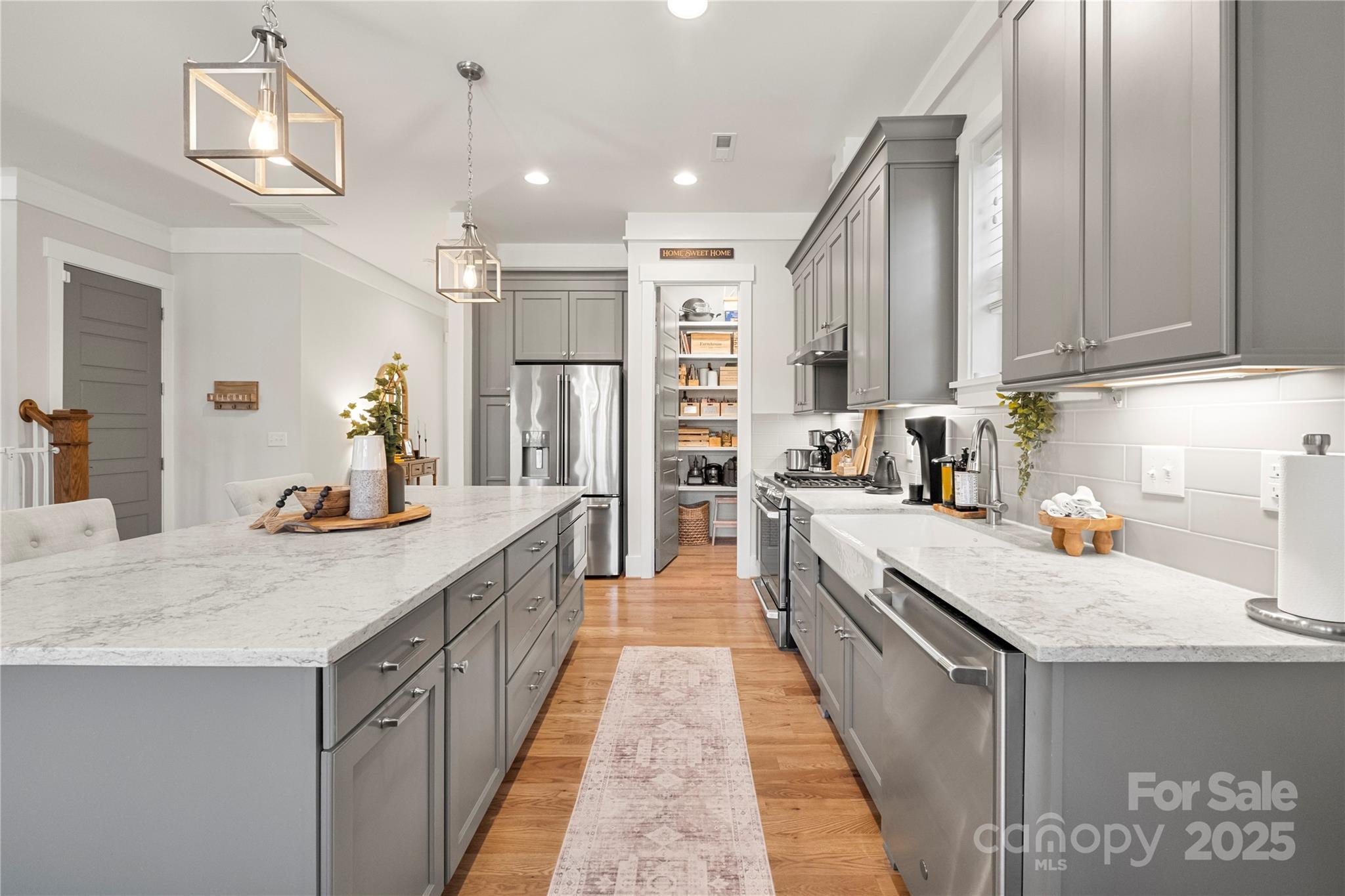 907 Millbrook Road Charlotte, NC 28211 - Photo 15 of 46 a kitchen with kitchen island granite countertop lots of counter top space