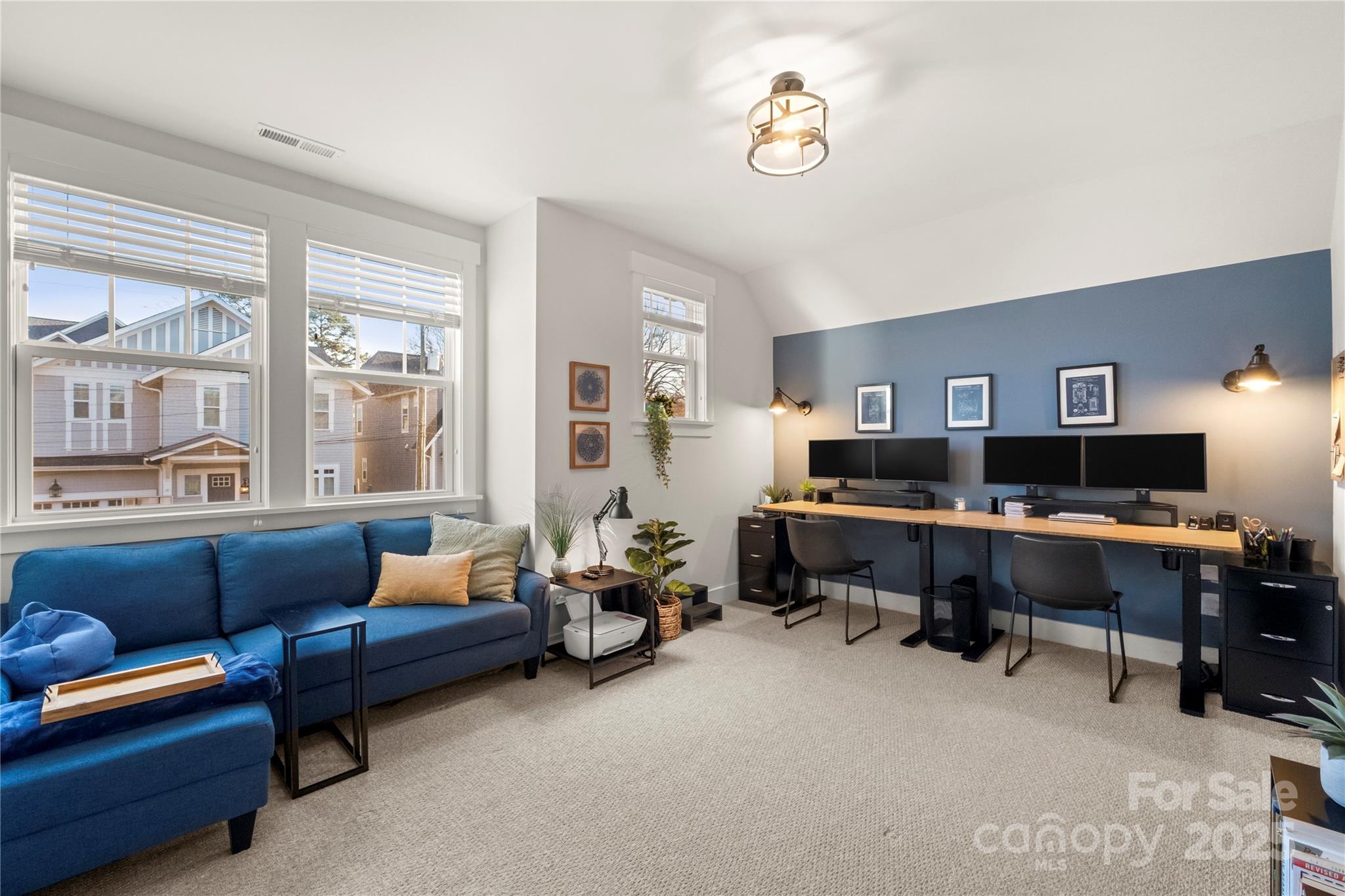 907 Millbrook Road Charlotte, NC 28211 - Photo 40 of 46 a work room with furniture and a window