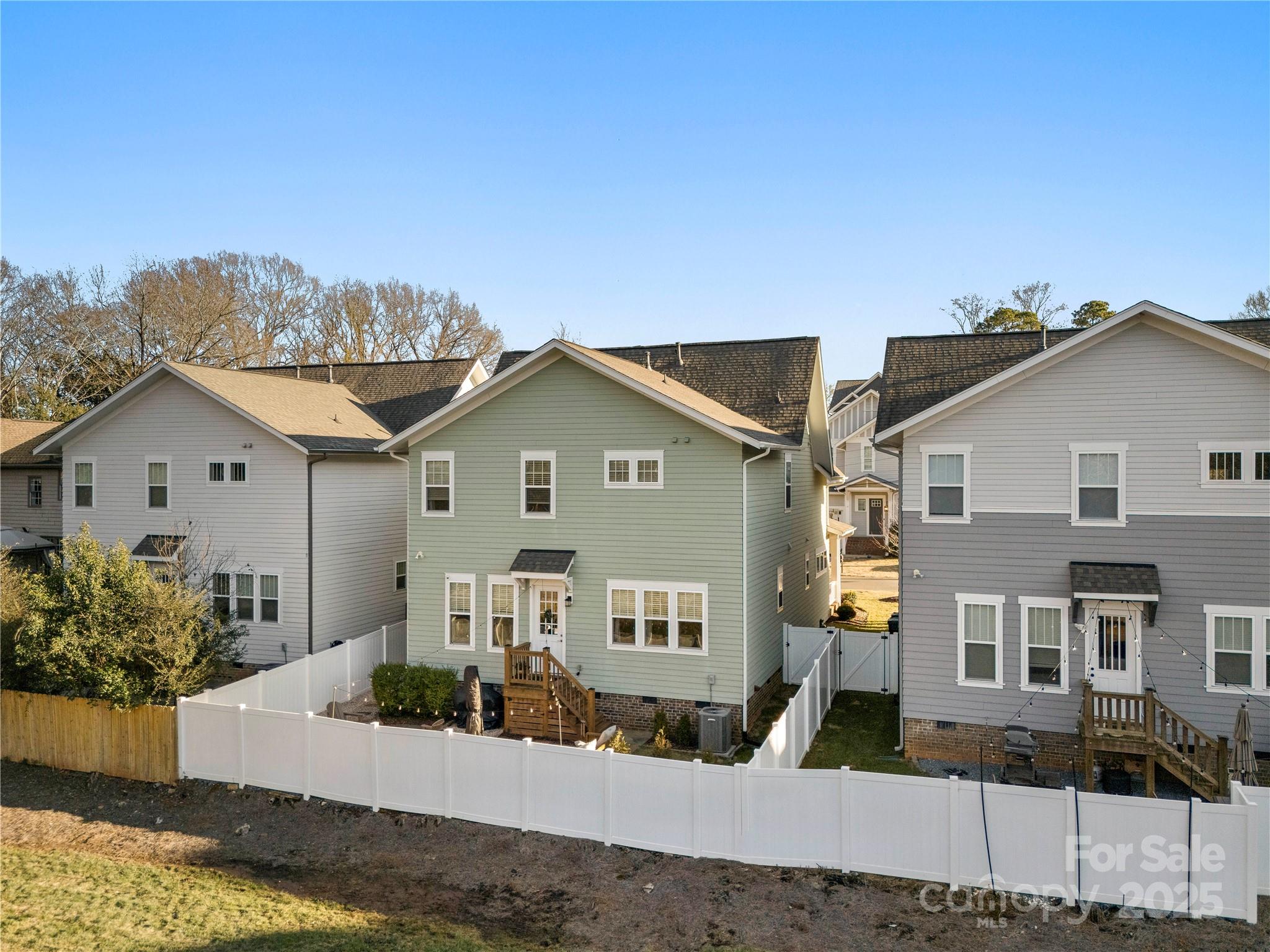 907 Millbrook Road Charlotte, NC 28211 - Photo 44 of 46 a front view of a house with a yard and garage
