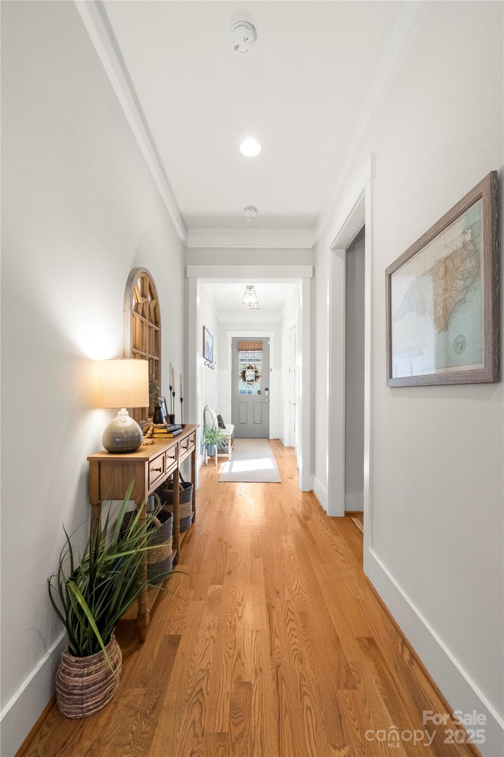 907 Millbrook Road Charlotte, NC 28211 - Photo 7 of 46 a view of a livingroom with furniture and wooden floor
