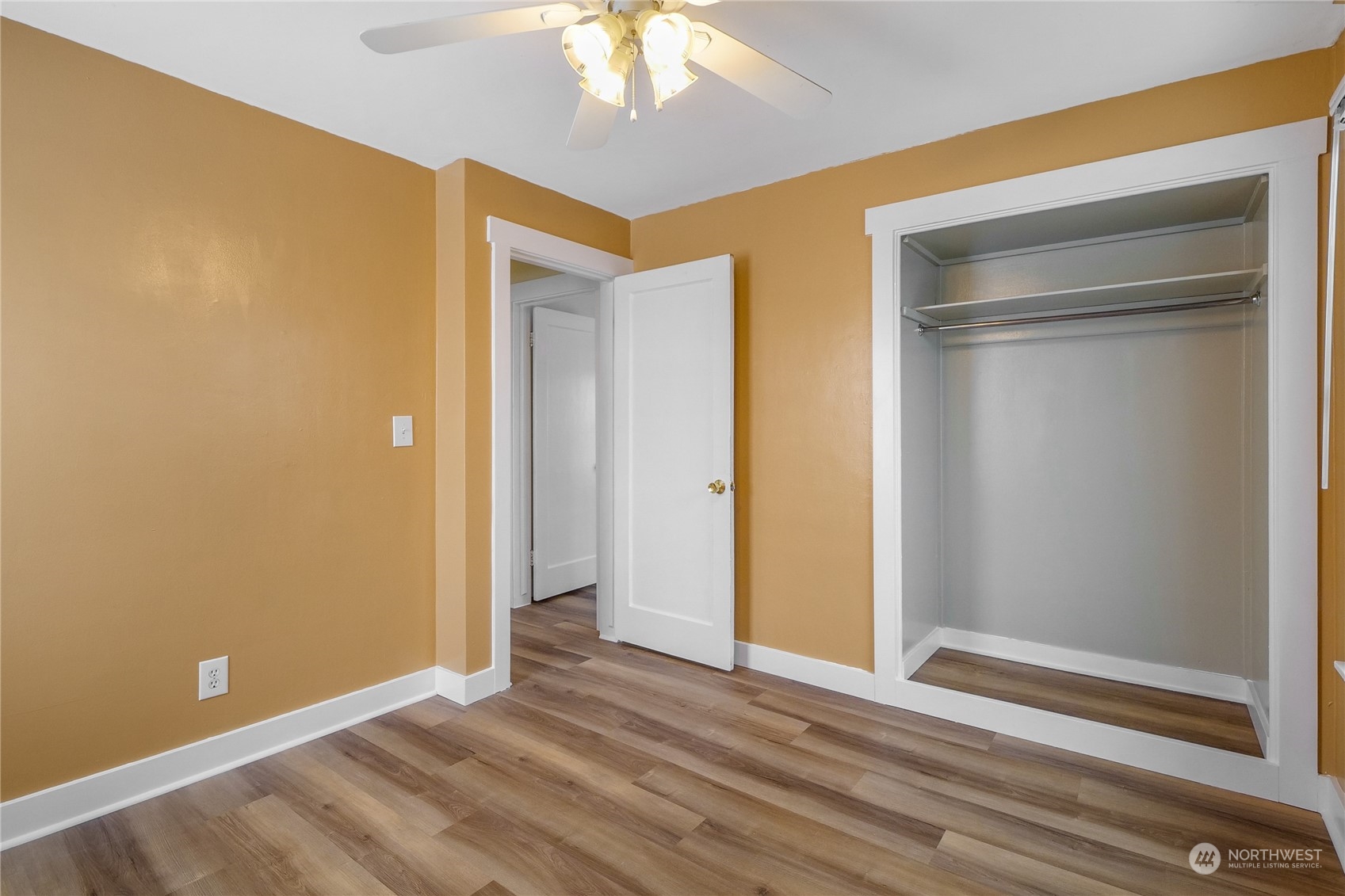 233 Statter Road Ephrata, WA 98823 - Photo 17 of 31 a view of an empty room with wooden floor and a window