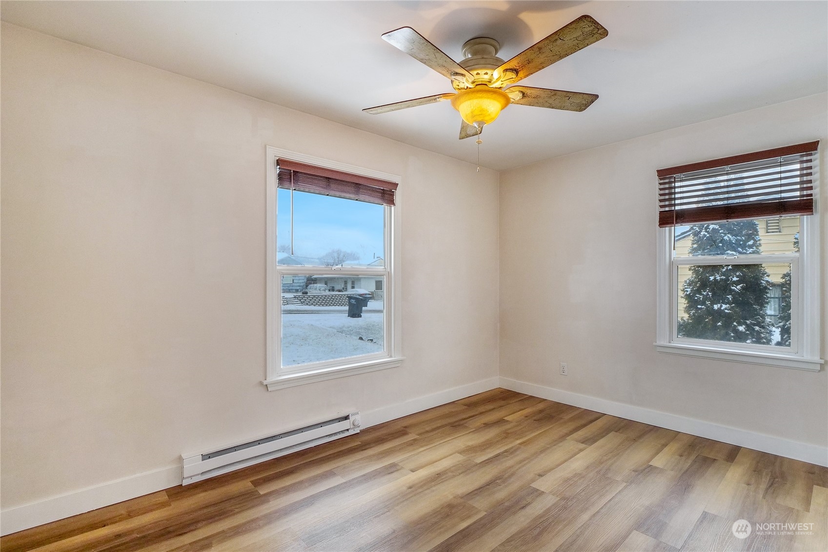 233 Statter Road Ephrata, WA 98823 - Photo 19 of 31 a view of an empty room with window and wooden floor