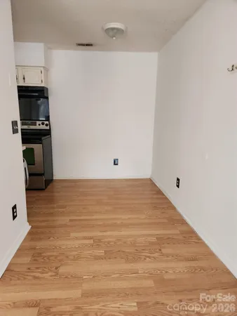 a view of kitchen space with wooden floor