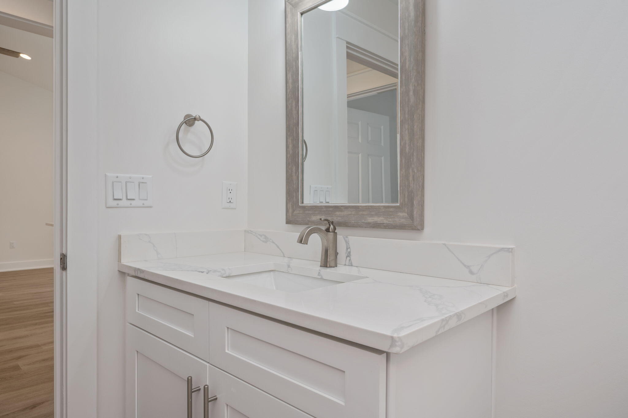 68 Iris Lane DeFuniak Springs, FL 32433 - Photo 18 of 34 a bathroom with a sink and a mirror