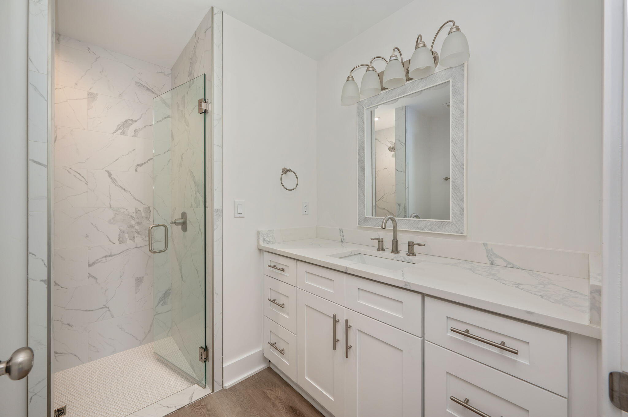 68 Iris Lane DeFuniak Springs, FL 32433 - Photo 27 of 34 a bathroom with a granite countertop sink a mirror and shower