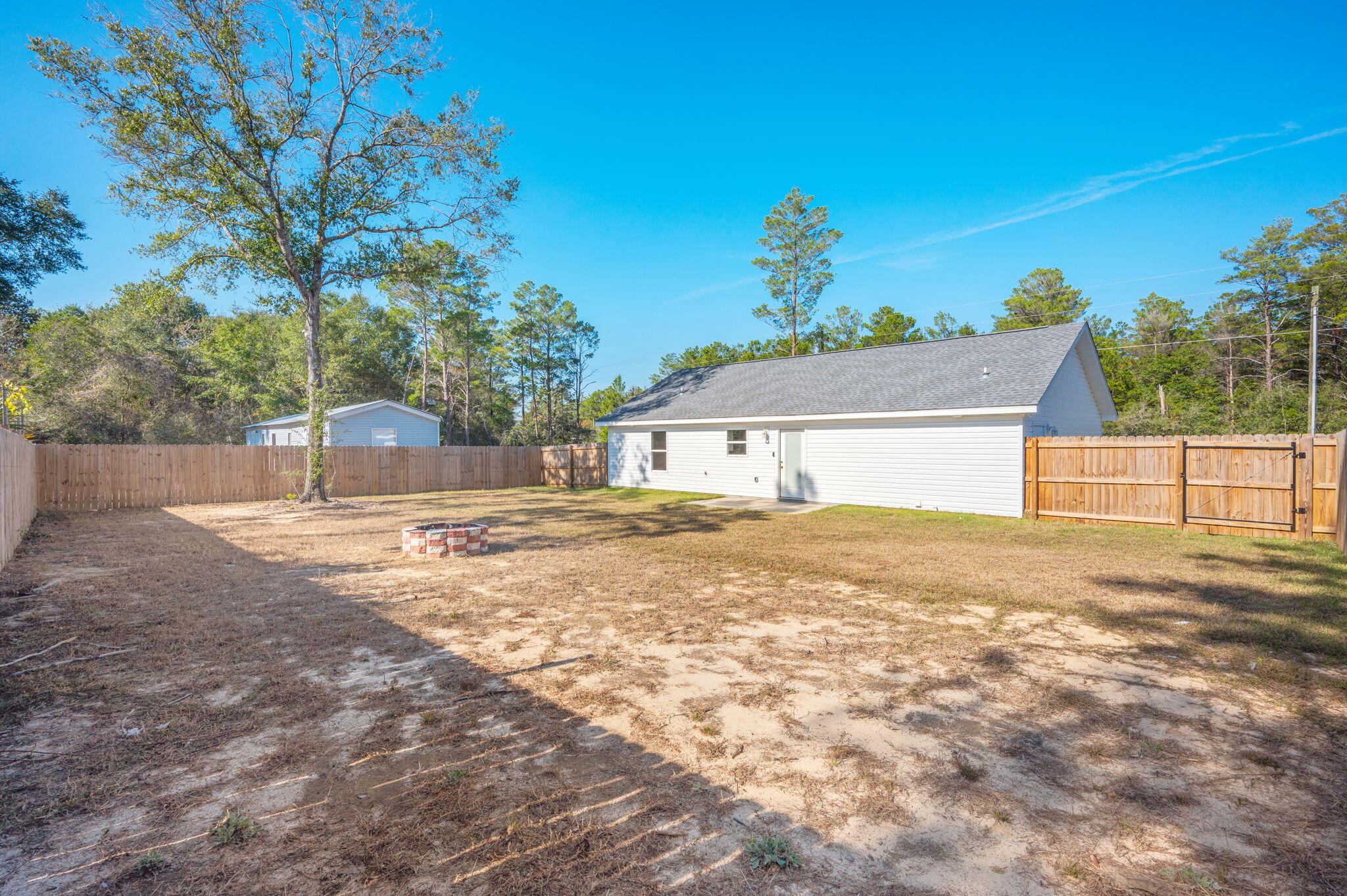 68 Iris Lane DeFuniak Springs, FL 32433 - Photo 31 of 34 a house view with a outdoor space