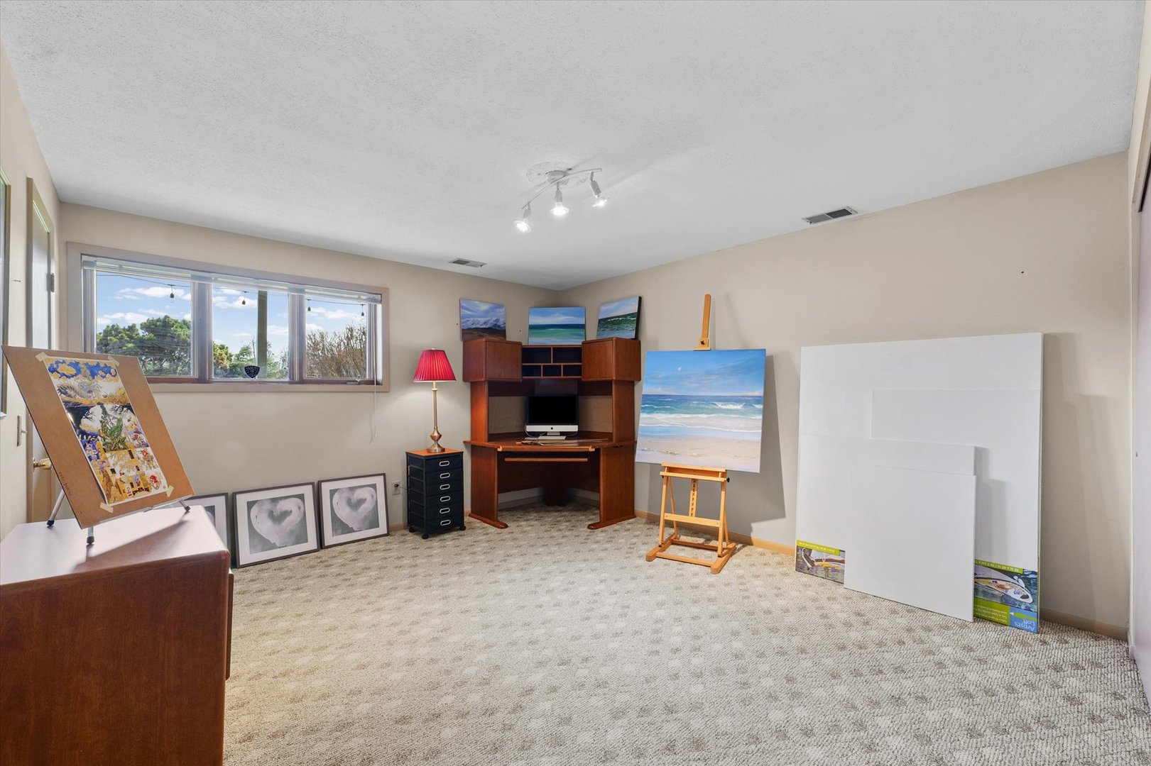 1850 Maynard Drive Champaign, IL 61822 - Photo 29 of 61 a living room with furniture and a flat screen tv