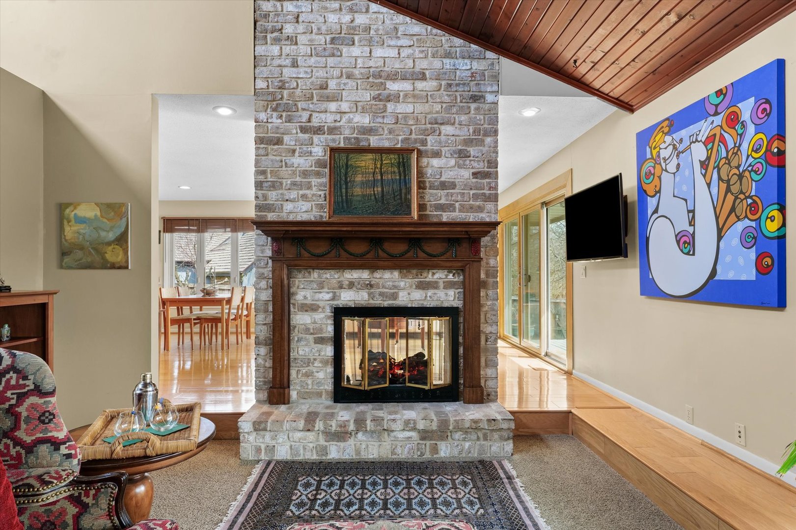 1850 Maynard Drive Champaign, IL 61822 - Photo 8 of 61 a living room with a fireplace and a rug