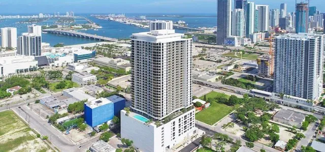 a view of a city with tall buildings