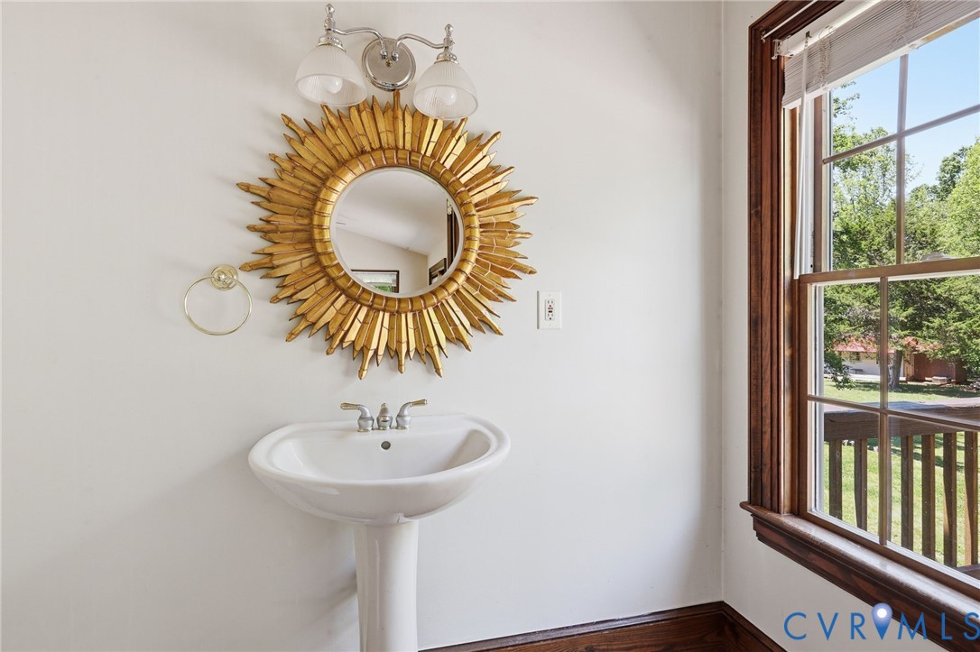 3355 Duke Road Powhatan, VA 23139 - Photo 26 of 67 a bathroom with a sink and a mirror
