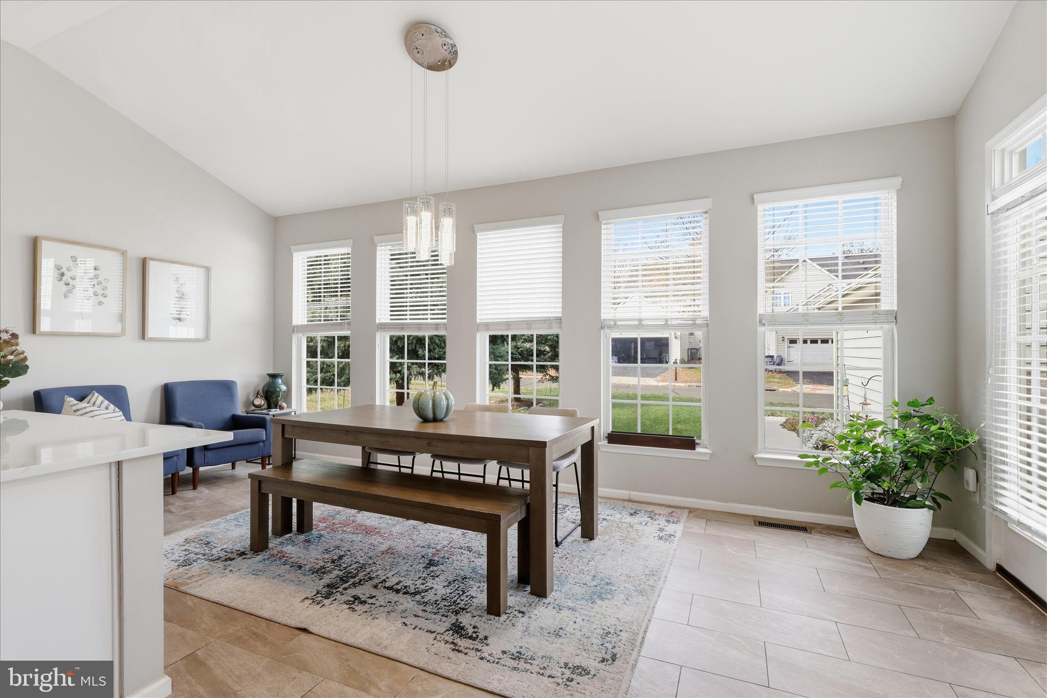 6711 Selbourne Lane Gainesville, VA 20155 - Photo 18 of 55 a living room with furniture and a potted plant