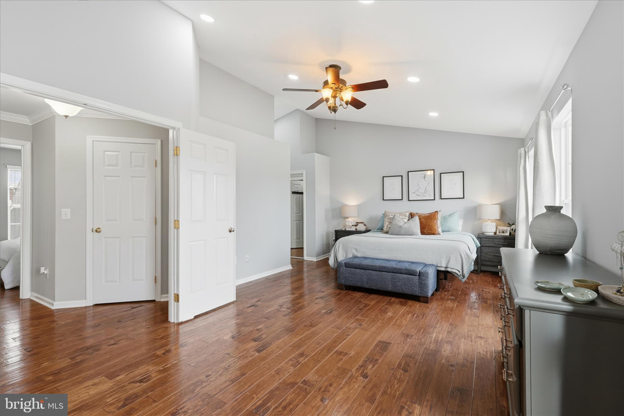 6711 Selbourne Lane Gainesville, VA 20155 - Photo 26 of 55 a bedroom with furniture and wooden floor