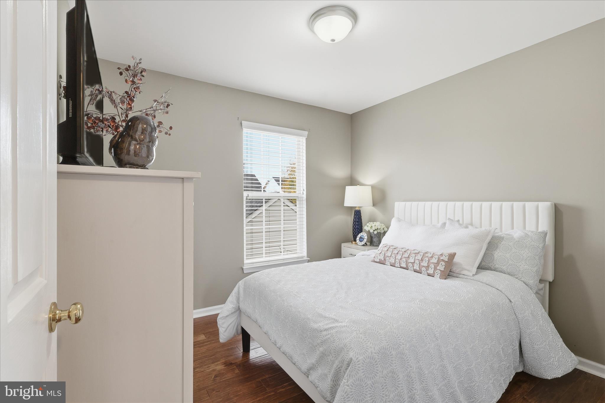 6711 Selbourne Lane Gainesville, VA 20155 - Photo 33 of 55 a bedroom with a bed and a window